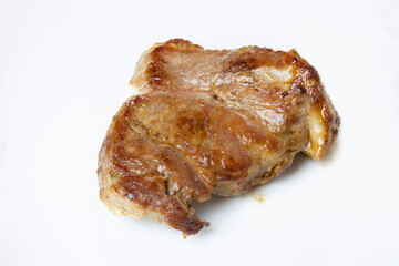 Piece of fried meat on a white background