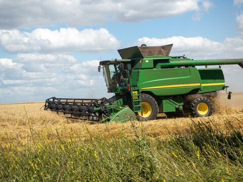 26.07.2020 Russia, Bryansk region. Green Agricultural Harvester. Agricultural machinery for harvesting. Concept of agriculture