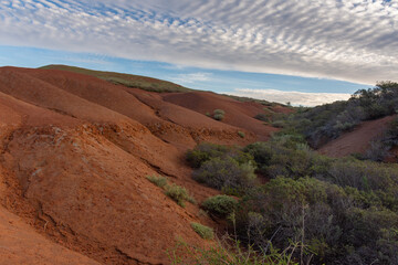 red desert landscape with beautiful sky