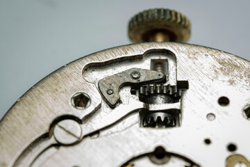 macro photo of pocket watch internal mechanism