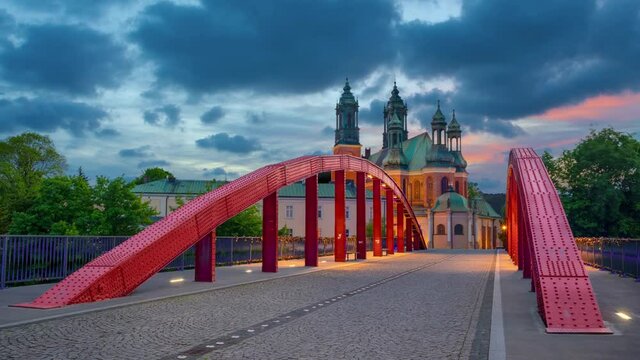 Poznan, Poland. Jordan bridge and Poznan Cathedral at dusk (static image with animated sky)
