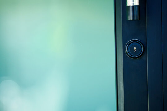 Closeup Green Glass Door With Sign On It