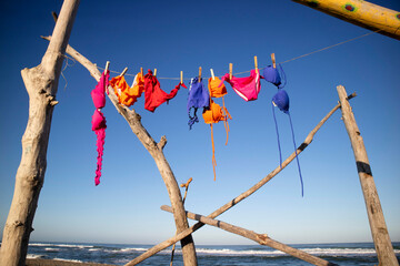  Women's swimsuit to dry on a free beach