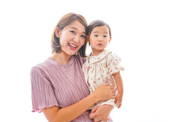 赤ちゃんを抱っこするお母さん