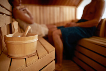 A young couple enjoying at sauna. Relationship, leisure, relaxation