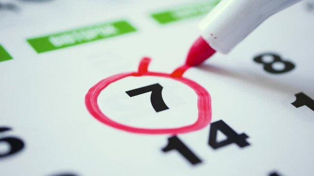 Save the Date written on a calendar 7