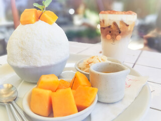 dessert with mango and cream