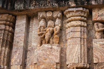 Close up of Kamasutra scenes on the wall of Konark sun temple, Odisha 