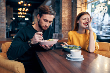married couple in a restaurant romantic dinner communication