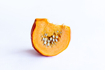 Piece of pumpkin isolated on white background.