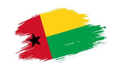 Patriotic of Guinea-Bissau flag in brush stroke effect on white background