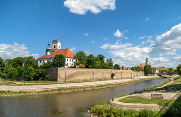 Fototapeta na wymiar View of Gyor downtown with the Bishops Castle and Cathedral tower by the Raba River.Hungary.