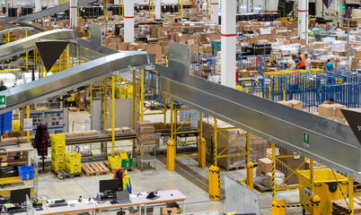 delivery warehouse general view with conveyor belts
