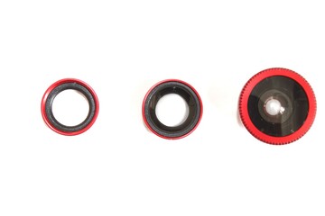 Top view of three phone camera lens on isolated white background