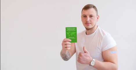 Caucasian Man smiling after receiving covid-19 vaccination.