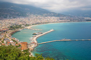The scenic view of Red Tower and Alanya Marina from Alanya Castle.