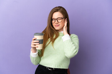 Teenager student girl over isolated purple background frustrated and covering ears