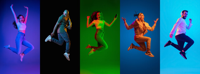 Portraits of group of people joyful jumping isolated on multicolored background in neon light,...