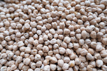 food background from a texture of raw chickpeas close-up