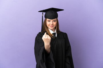 Young university graduate over isolated purple background doing coming gesture