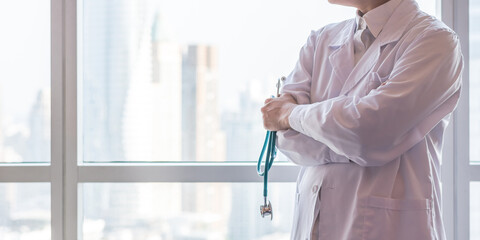 Medical doctor or physician in clinic office or hospital lab for patient trust, professional...