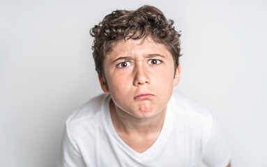 Fototapeta premium portrait of young and cute teenager isolated on white