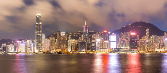 Fototapeta na wymiar skyline panorama of Colorful magnificent night city view of Central and Shengwan, Victoria Harbour, Hong Kong, photo from West Kowloon Waterfront Promenade