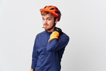 Young cyclist blonde man isolated on white background laughing