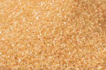 food background of yellow sanding sugar, full frame,