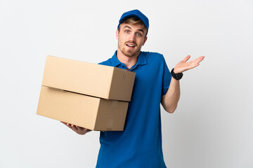 Young delivery blonde man isolated on white background with shocked facial expression