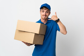 Young delivery blonde man isolated on white background making phone gesture. Call me back sign