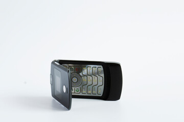 A flip cover model from the first generation mobile phones from the 90's.