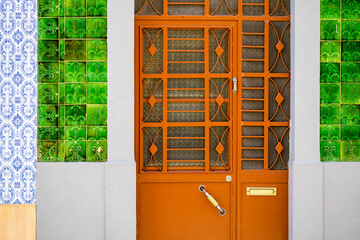 Doors to typical fisherman's house coverd with tiles, Olhao, Algarve, Portugal