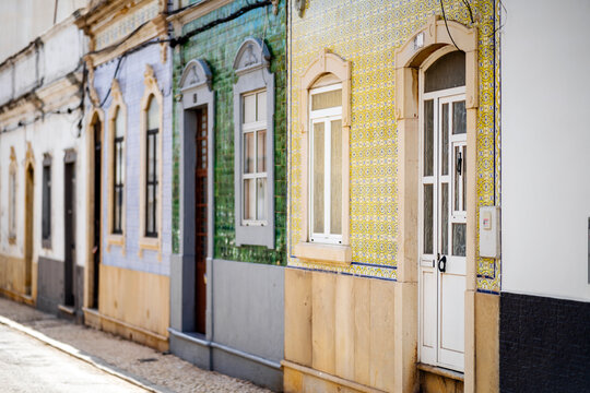 Beautiful houses cover with traditional tiles called azulejo, Olhao, Portugal