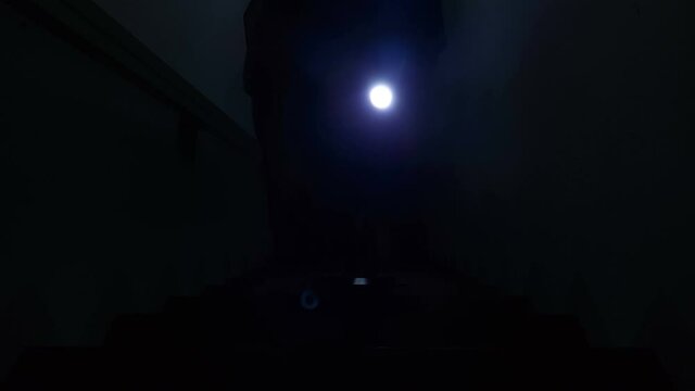 Men using flashlight after power outage