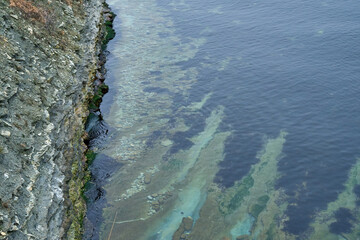 Image of the rocky shores of the cold sea.