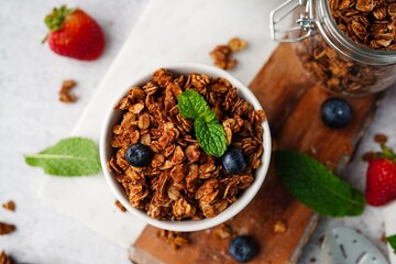 Homemade Chocolate cocoa Granola - healthy breakfast concept, selective focus