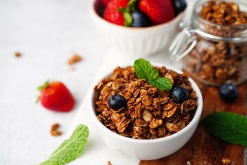 Homemade Chocolate cocoa Granola - healthy breakfast concept, selective focus
