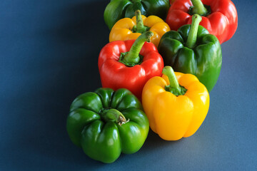 weet pepper, red, green, yellow paprika, isolated on black