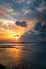 Dramatic clouds and sunrise over Atlantic Ocean