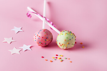 Tasty Pink and Green Cake Pops Tasty Modern Dessert Pink Background Horizontal