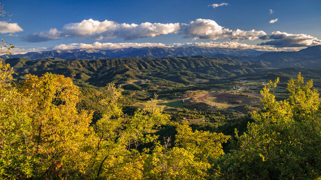 Autumnal sunrise seen from the Santuari dels Munts viewpoint in Llu&ccedil;an&egrave;s (Osona, Barcelona, Catalonia, Spain)