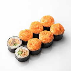 Hot baked Sushi roll isolated on white background. Traditional Japanese food. Healthy Oriental meal. Wellness concept. Top Side view. Soft focus.