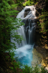 Fototapeta na wymiar Cueva Waterfall in summer (Ordesa and Monte Perdido National Park, Spain, Pyrenees)