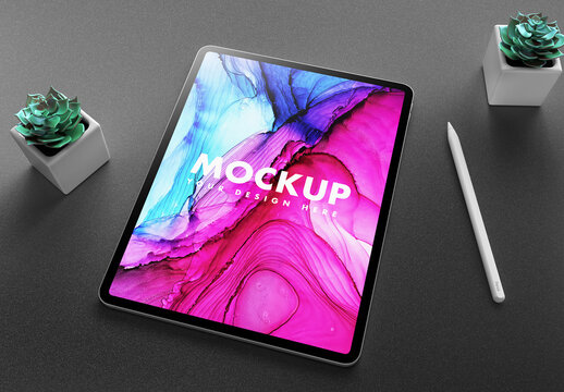 Tablet Mockup on a Clean Desk with Trendy Succulents Flowers