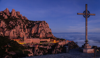 Montserrat and the Montserrat abbey at sunrise, from the Creu de Sant Miquel viewpoint (Barcelona...