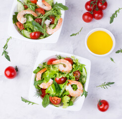 Delicious and healthy shrimp salad with herbs and tomatoes. Dietary nutrition for weight loss. Recipe for cooking fresh seafood. Mediterranean cuisine.