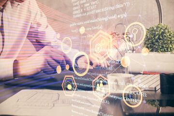 Multi exposure of man's hands holding and using a digital device and data theme drawing. Innovation concept.