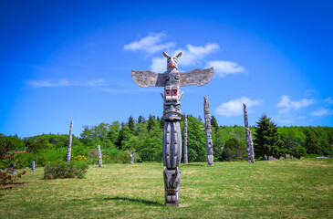 The burial place of First Nations - indigenous people. The view on the sacred totem poles on the...