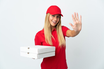 Pizza delivery woman holding a pizza isolated on white background counting five with fingers